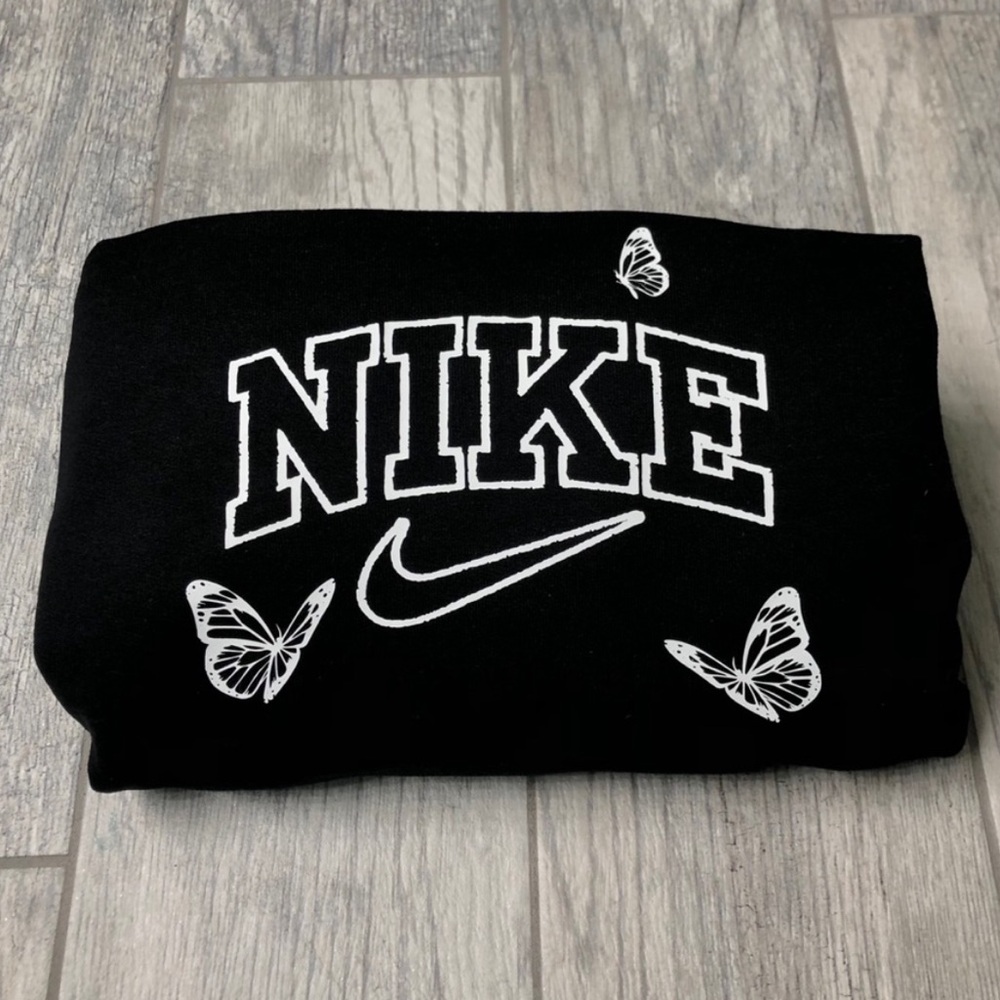 Nike Black Crewneck with White Logo and Butterfly Accents